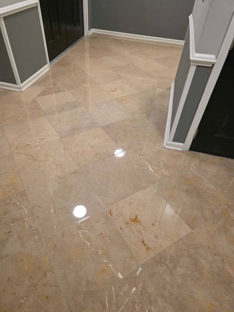 Polished stone floor with veining from a Rose Restoration job in Tysons, VA