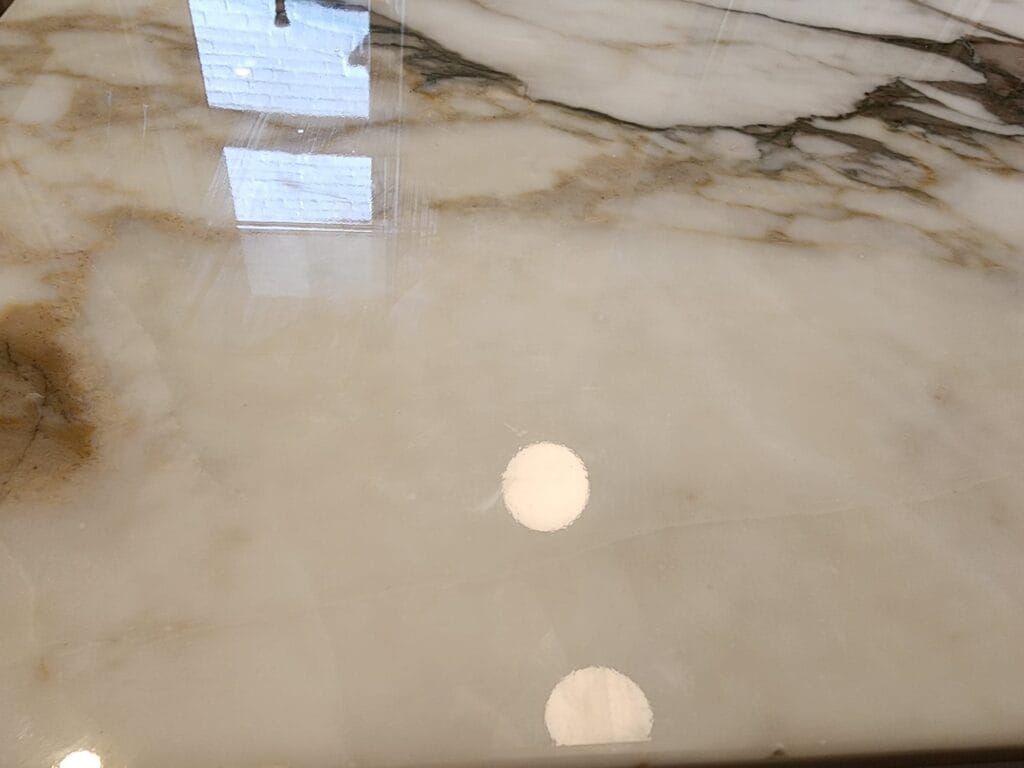 Polished veined stone surface