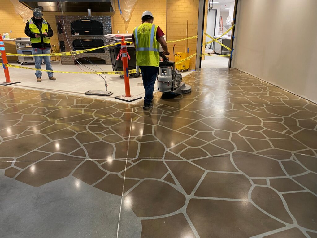 Rose crew on a stenciled concrete floor