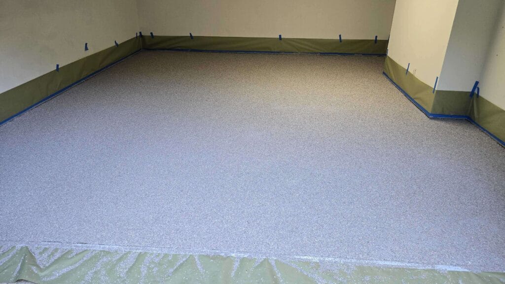 Speckled epoxy floor surface from a Rose Restoration job in Washington, DC