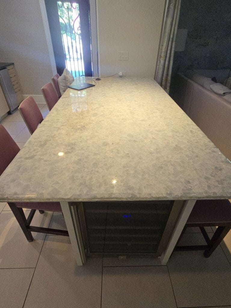 Stone countertop with integrated wine cooler from a Rose Restoration job in Washington, DC