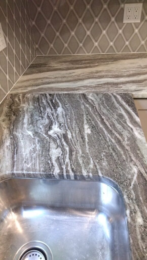 Stone countertop with sink from a Rose Restoration job in Herndon, VA