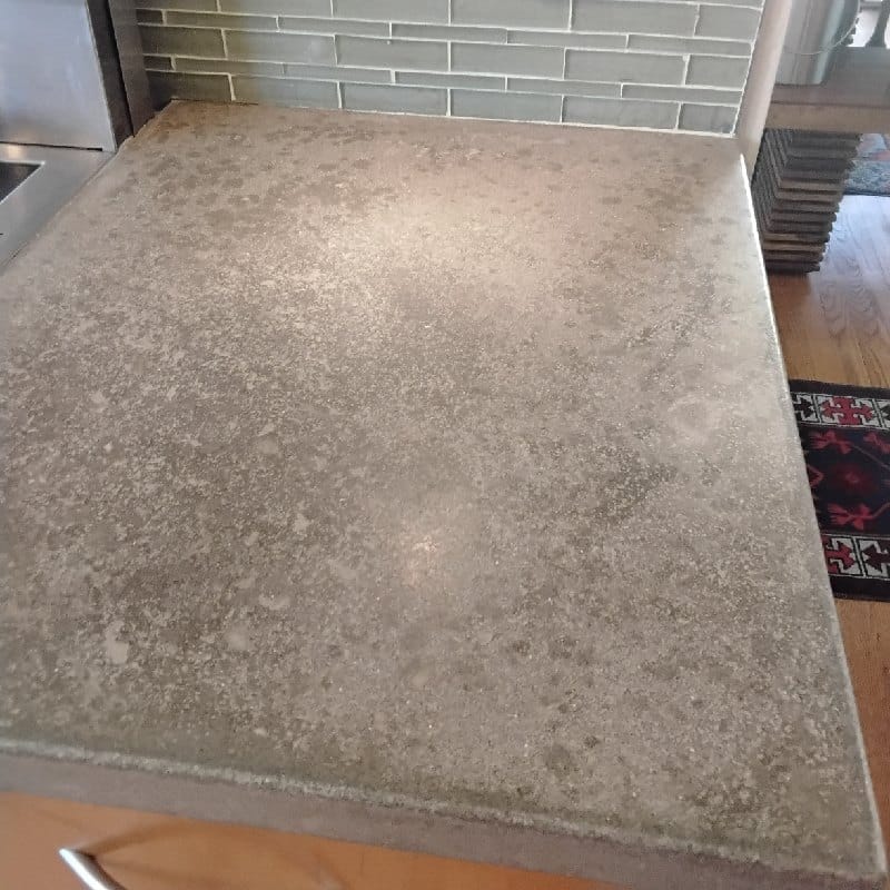 Stone countertop with tiled backsplash from a Rose Restoration job in Chevy Chase, MD