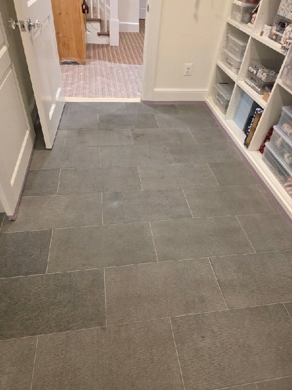 Stone floor with gray tiles from a Rose Restoration job in Great Falls, VA