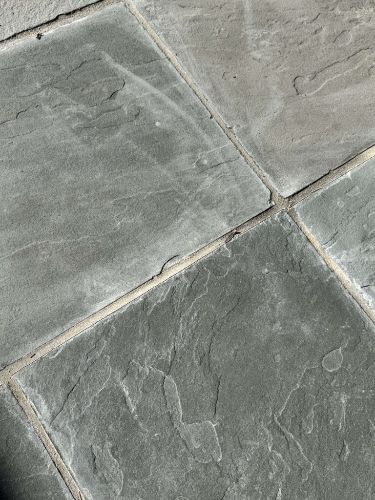 Stone floor with natural texture from a Rose Restoration job in Bethesda, MD