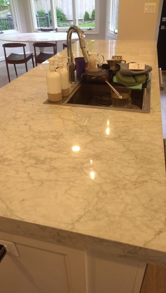 Stone kitchen island from a Rose Restoration job in Chevy Chase, MD