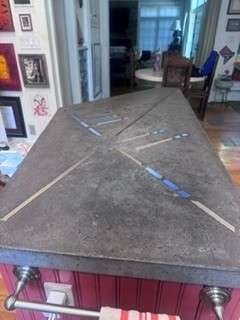 Stone table top with inlaid strips from a Rose Restoration job in Washington, DC