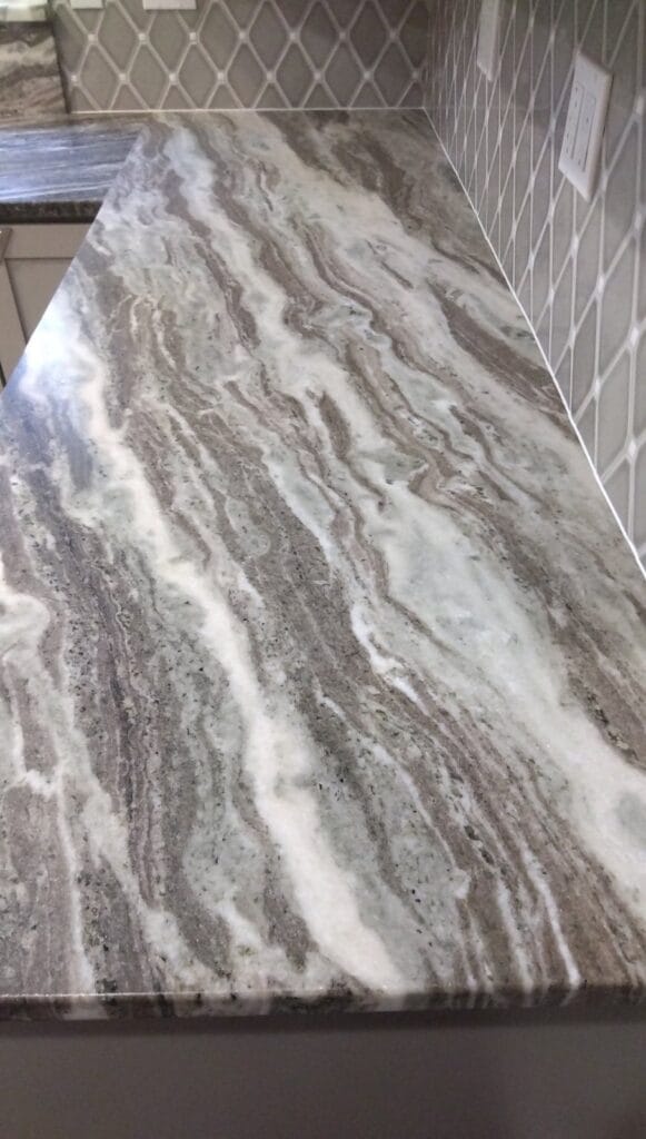 Veined stone countertop from a Rose Restoration job in Herndon, VA