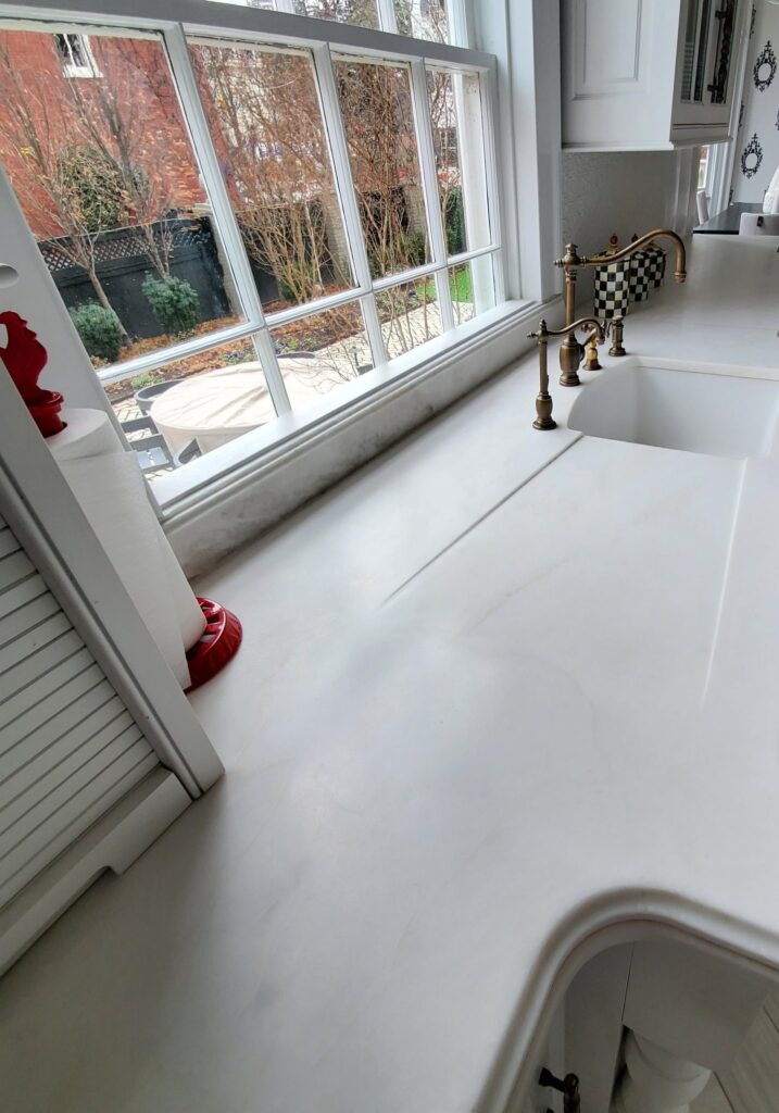 White kitchen countertop with a sink