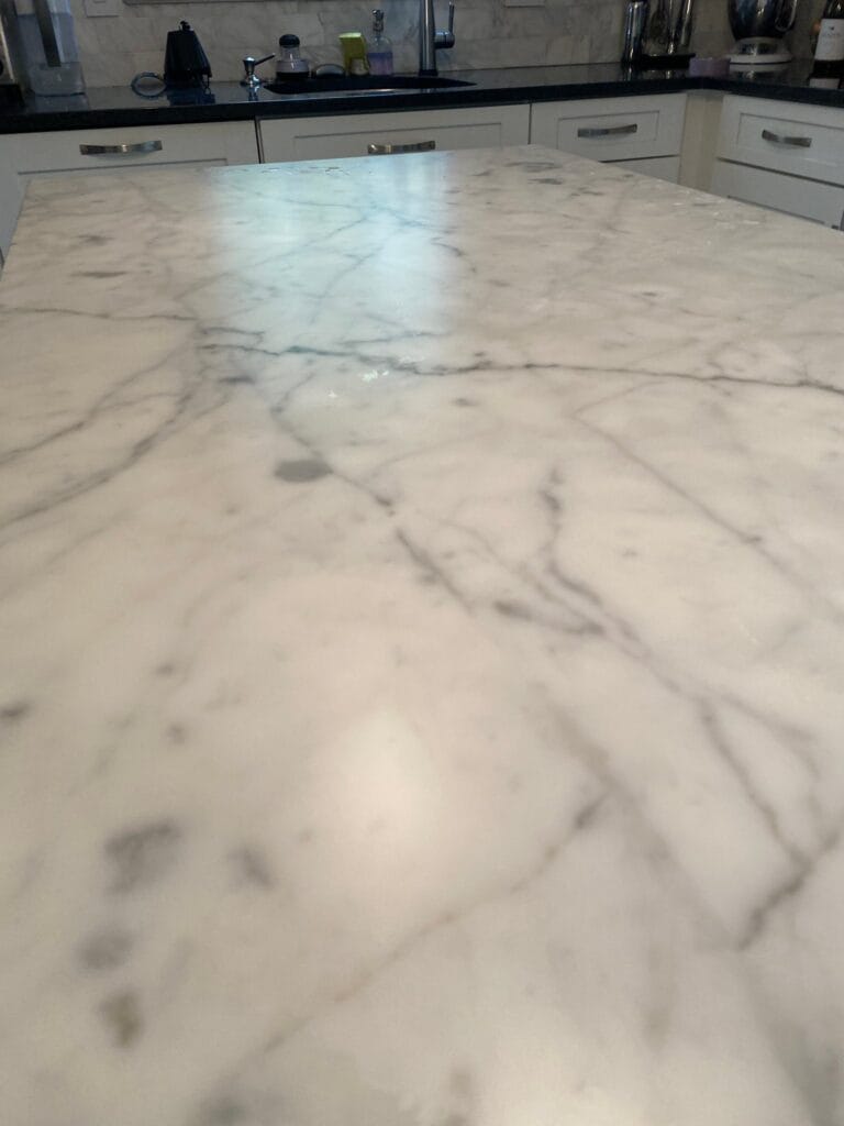 White marble countertop with grey veining
