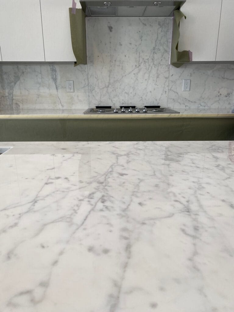 White marble kitchen countertop with grey veining