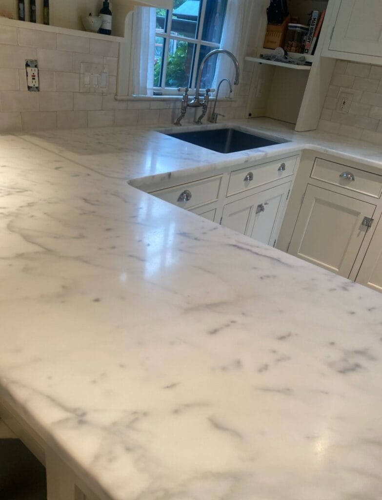 White stone kitchen countertop from a Rose Restoration job in Bethesda, MD