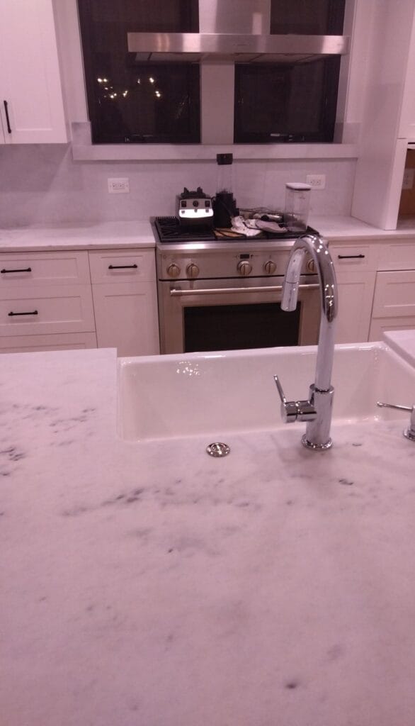 White stone kitchen island from a Rose Restoration job in Washington, DC