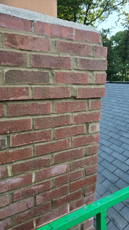 Red brick wall with mortar joints, Rose Restoration project