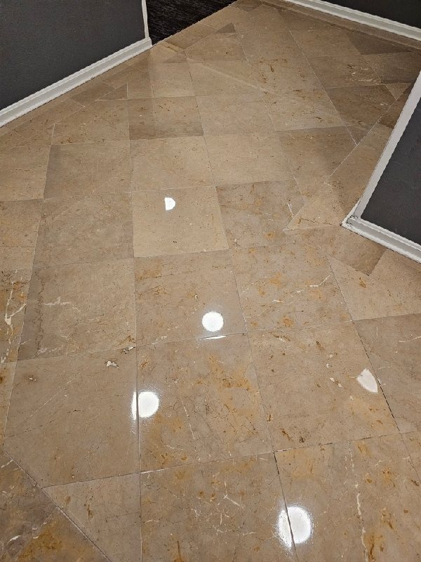 Polished stone floor with reflective tiles, Rose Restoration project