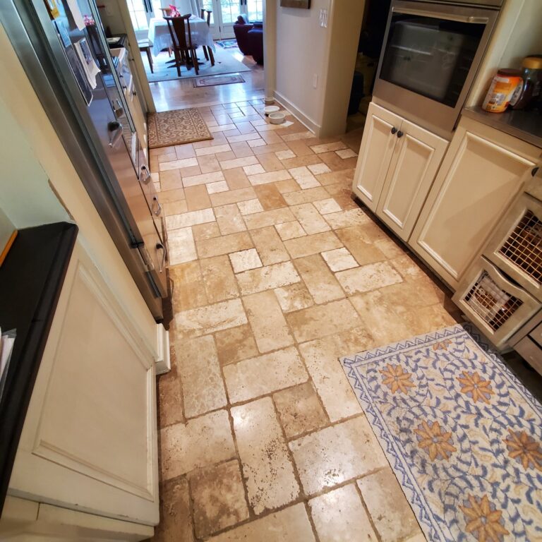 Stone floor with patterned rug, Rose Restoration project