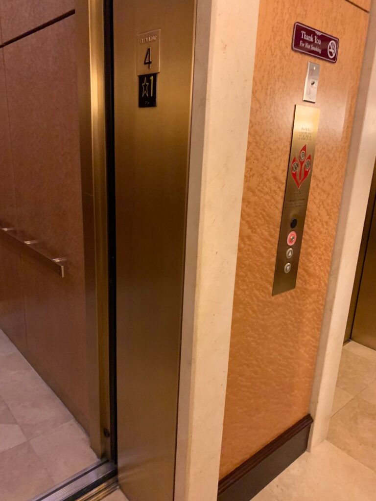 Polished metal elevator door surface, Rose Restoration project