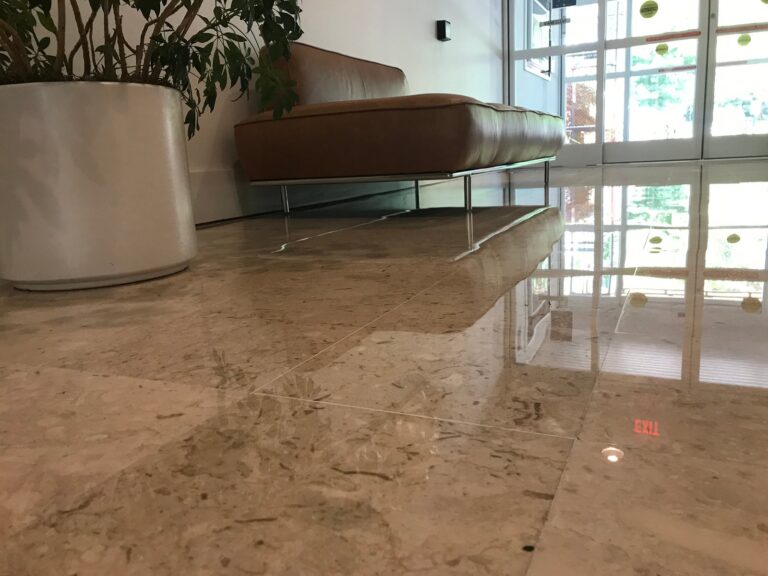 Polished stone floor with reflections, Rose Restoration project