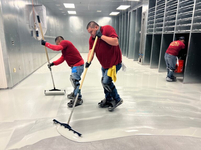 Smooth concrete floor being applied, Rose Restoration project