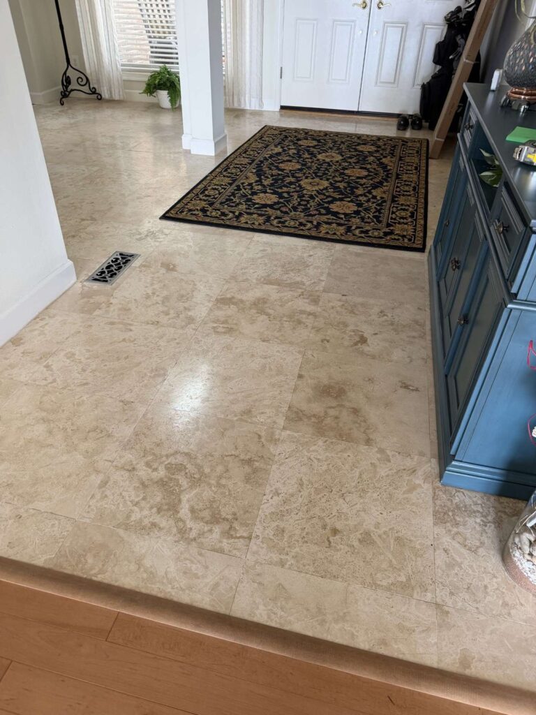 Polished stone floor with rug, Rose Restoration project