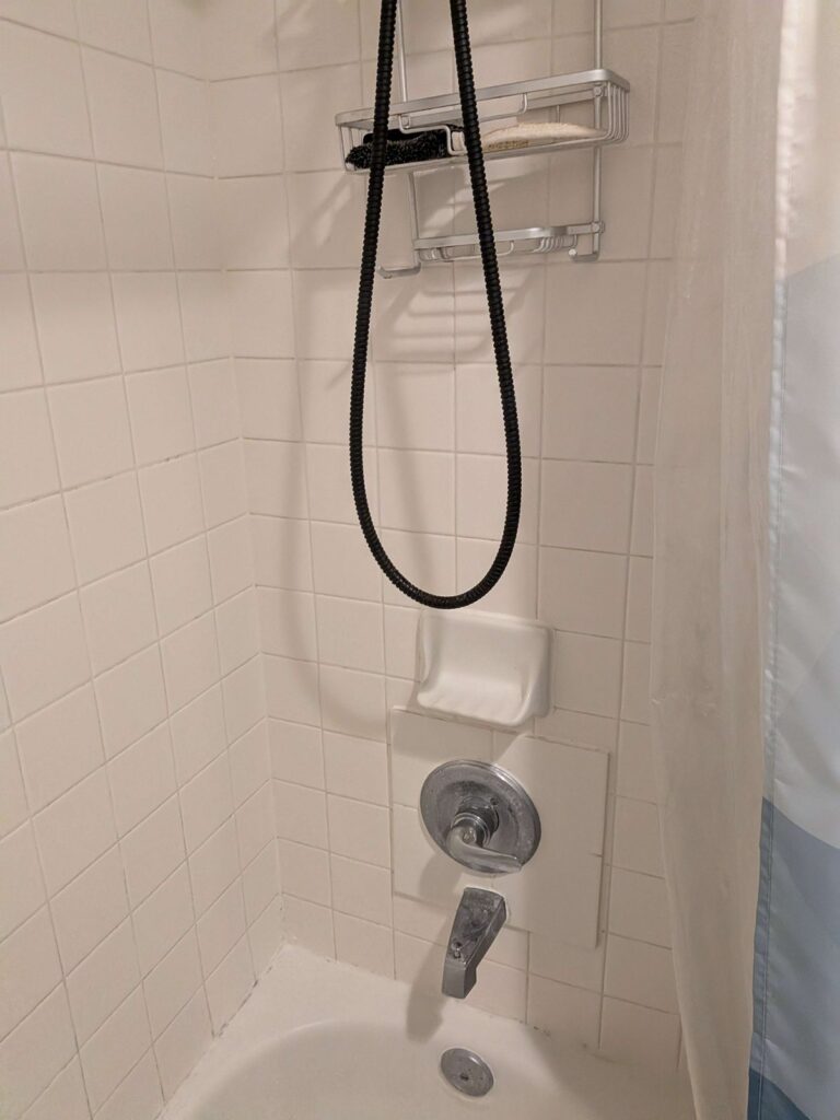 White tiled shower wall, Rose Restoration project