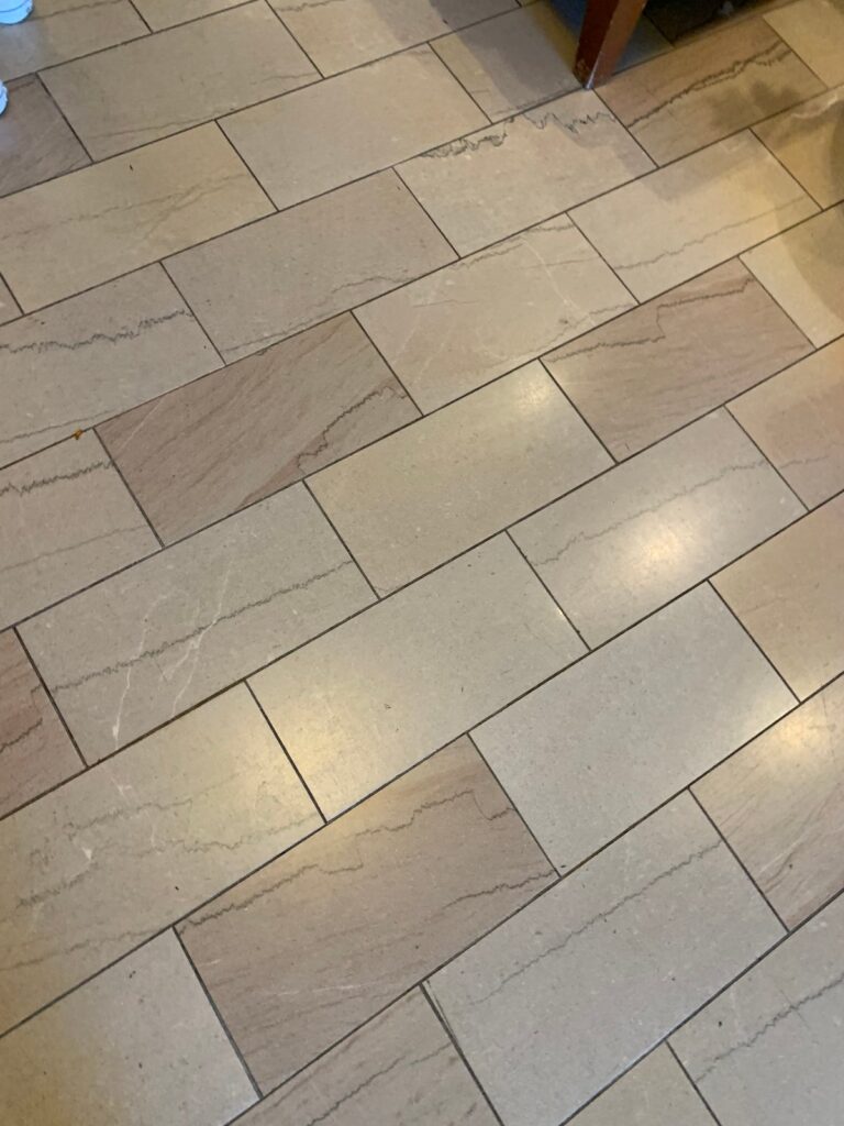 Stone floor with natural veining, Rose Restoration project