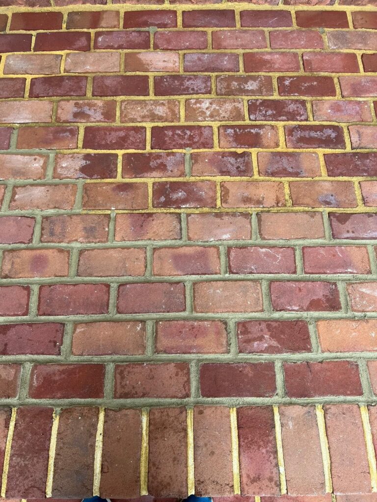 Restored brick pavement with yellow mortar, Rose Restoration project