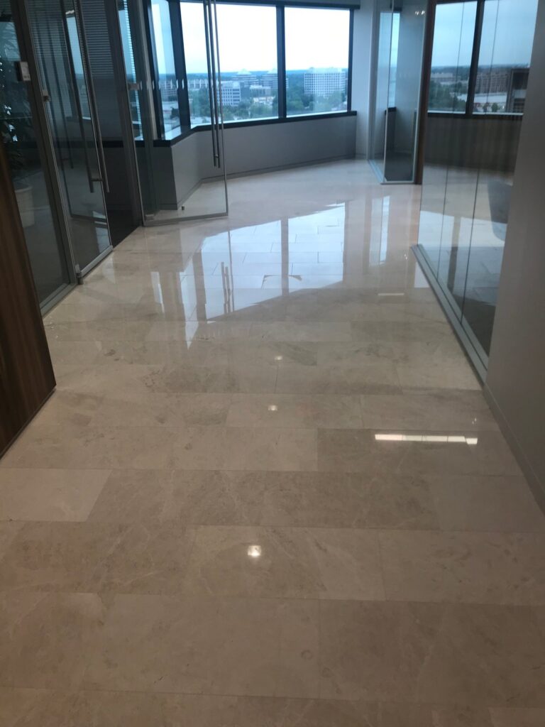 Polished stone floor with glass walls, Rose Restoration project