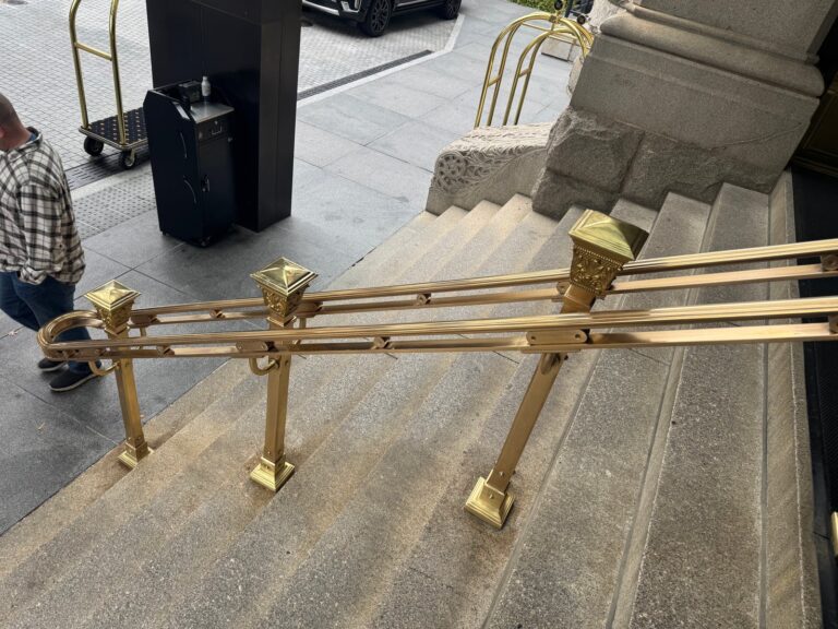 Stone staircase with golden railings, Rose Restoration project