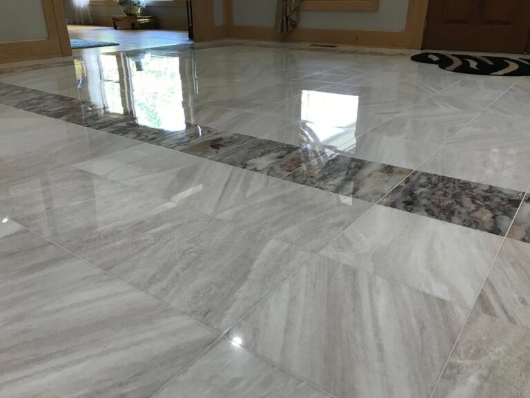 Polished marble floor with veined pattern, Rose Restoration project