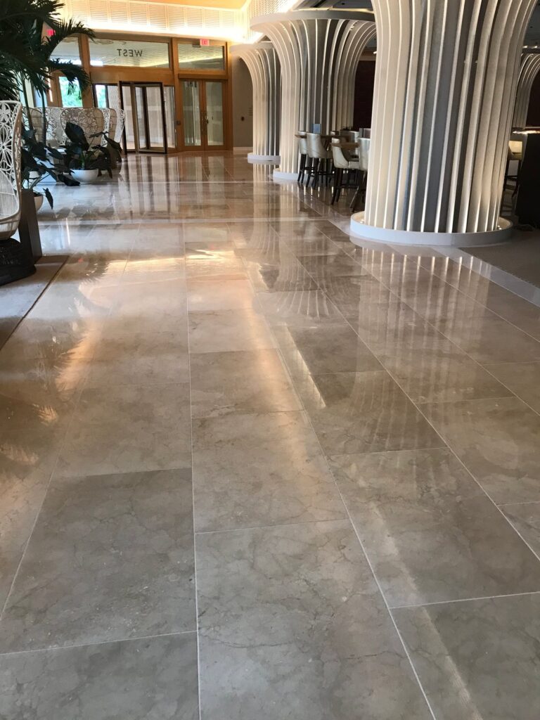 Polished stone floor with reflective surface, Rose Restoration project