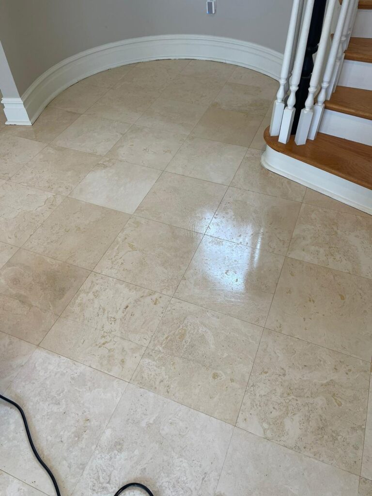 Polished stone floor with staircase nearby, Rose Restoration project