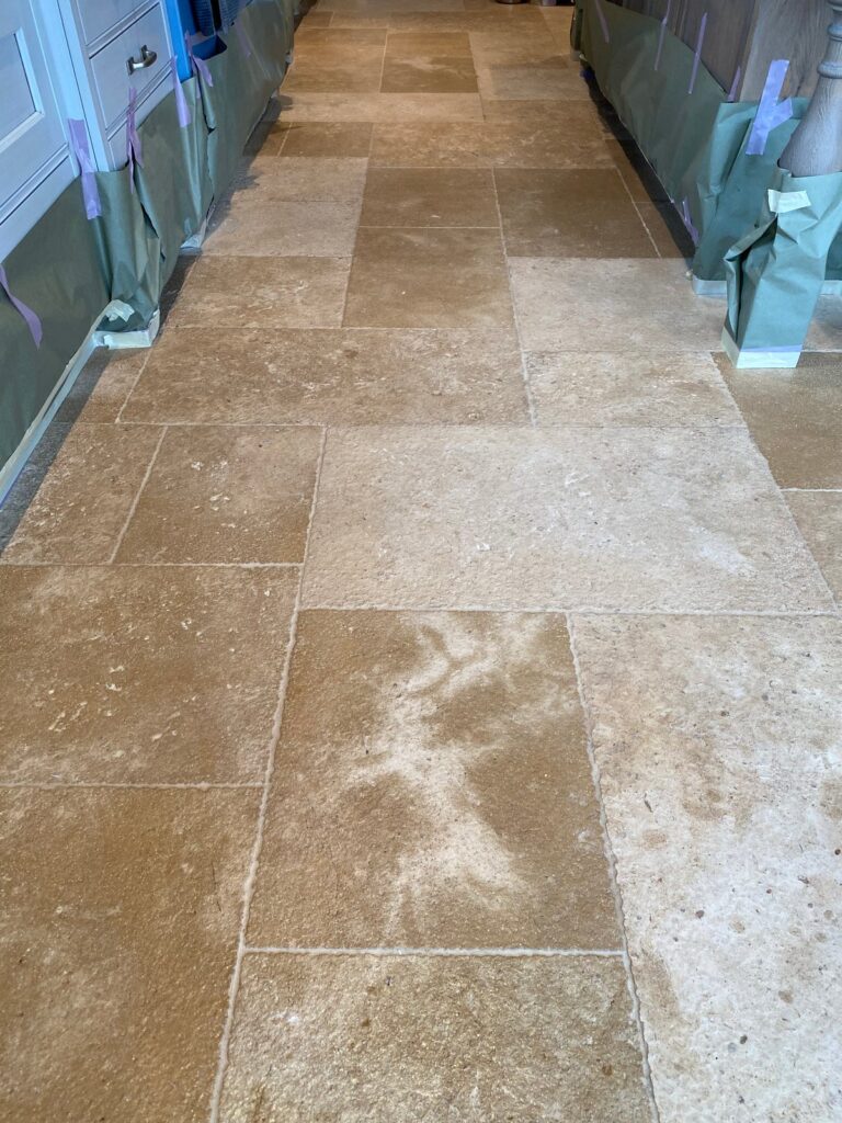 Stone floor with visible grout lines, Rose Restoration project