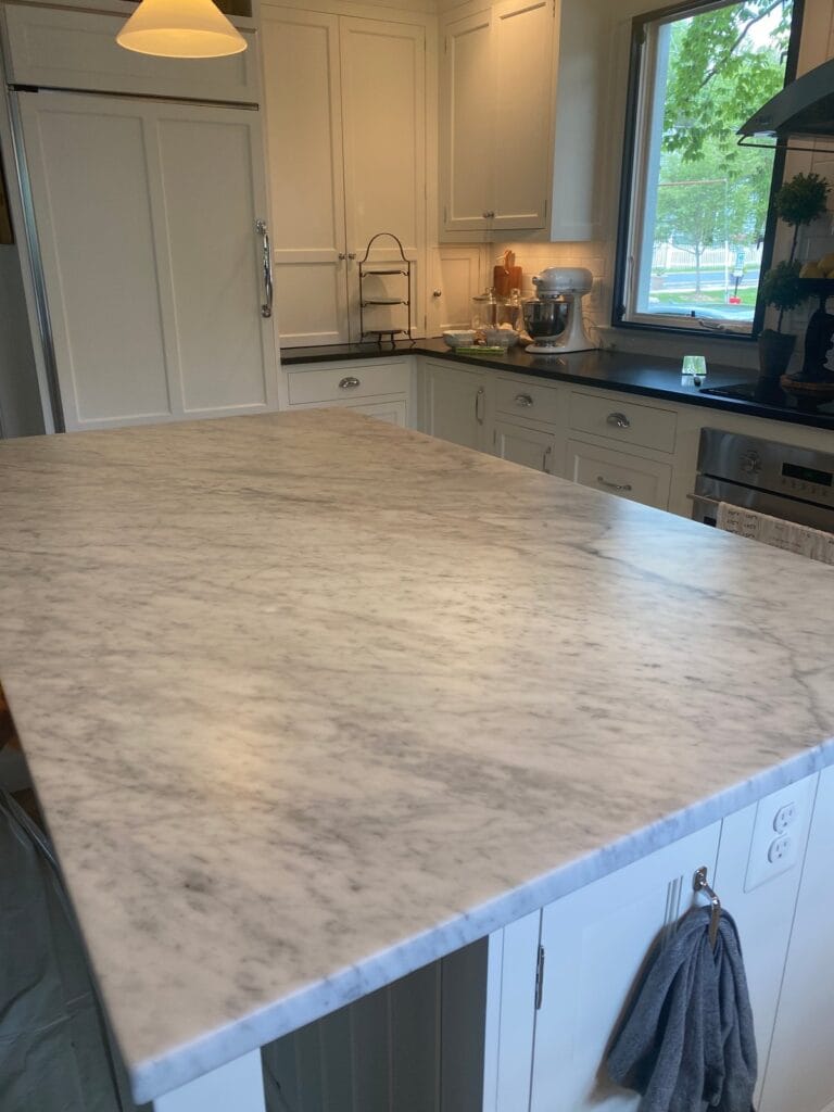 Marble countertop with white cabinets, Rose Restoration project