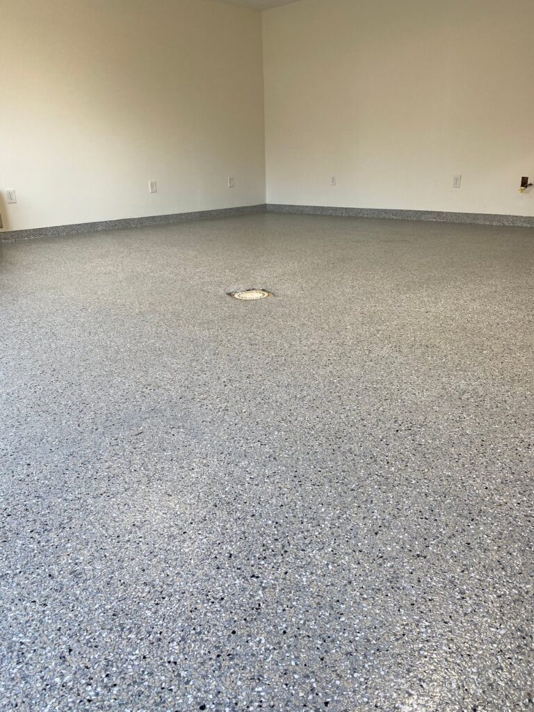 Speckled epoxy floor surface, Rose Restoration project
