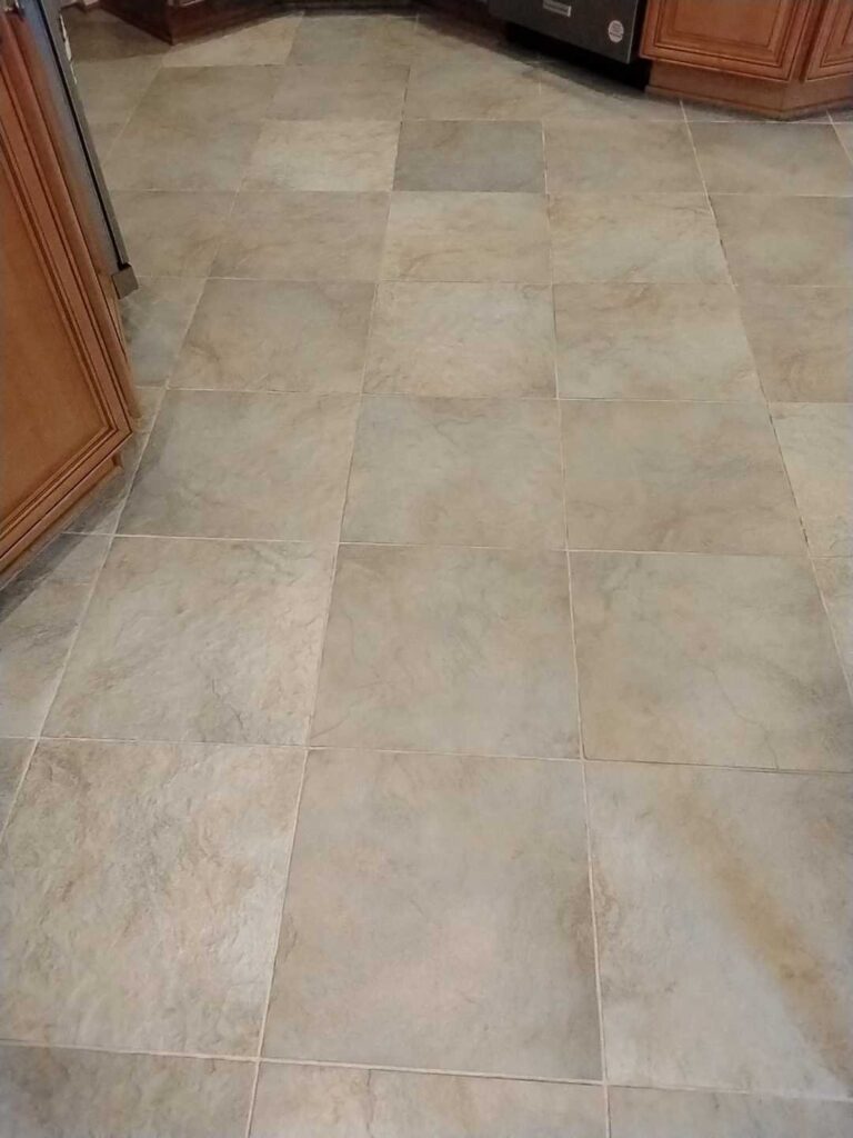 Stone kitchen floor with subtle veining, Rose Restoration project