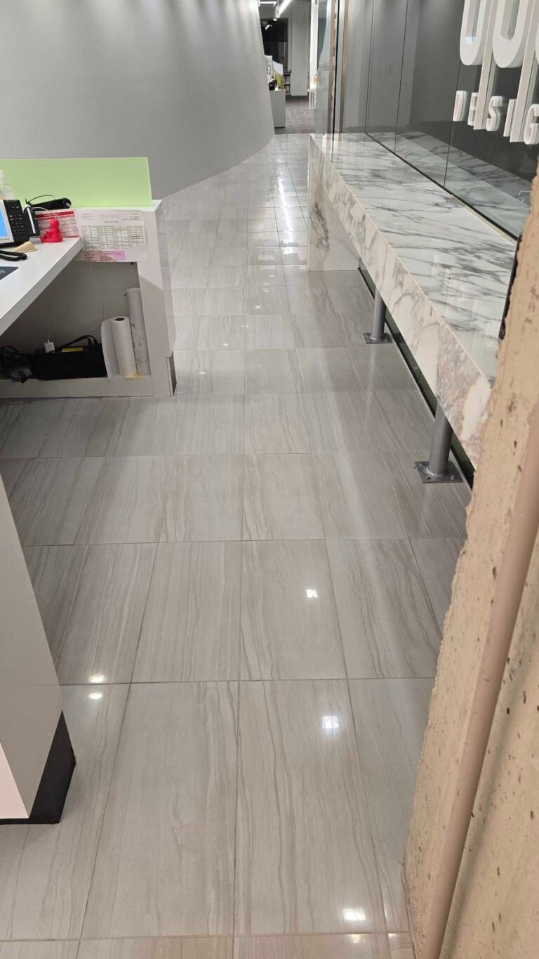 Polished stone floor with reflective surface, Rose Restoration project
