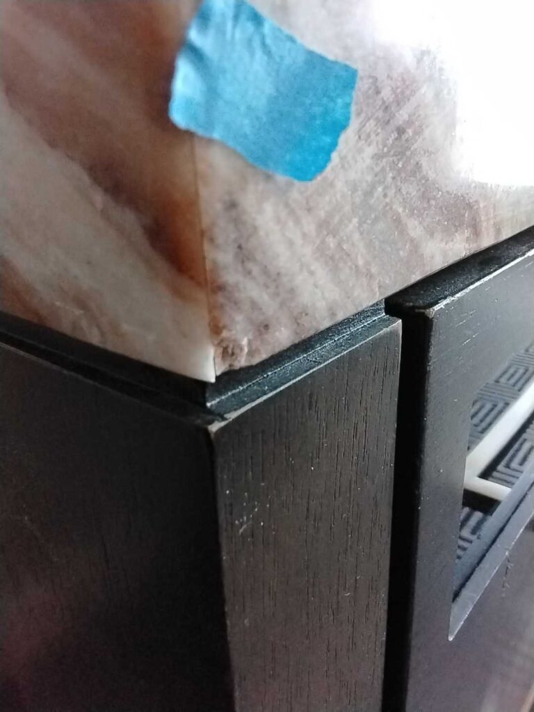 Marble countertop with blue tape, Rose Restoration project