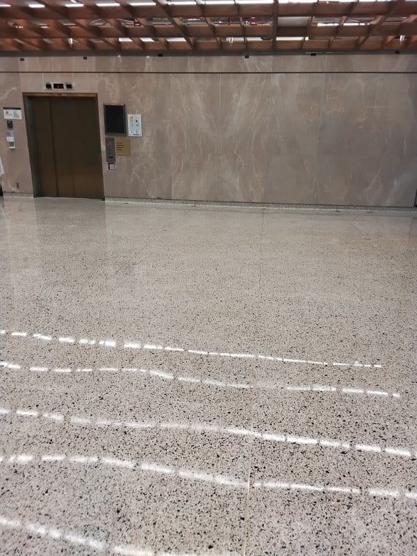 Stone floor with reflective finish, Rose Restoration project