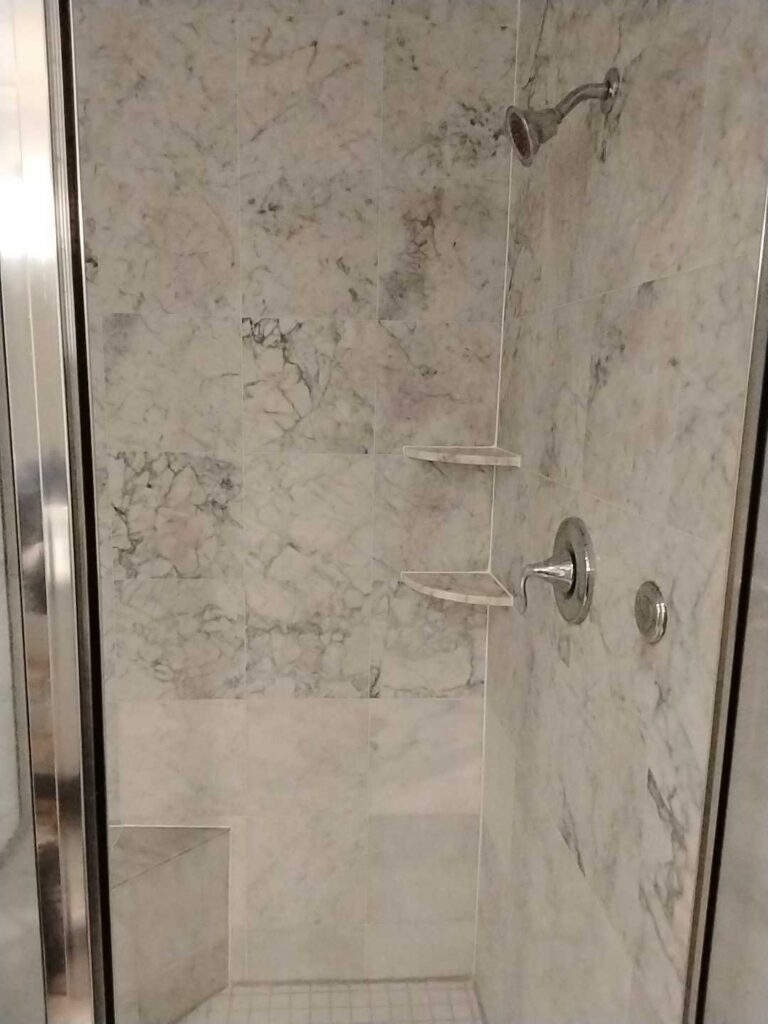 Marble shower walls with shelves, Rose Restoration project