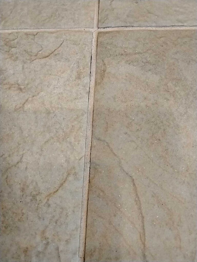 Stone tile floor with grout lines, Rose Restoration project