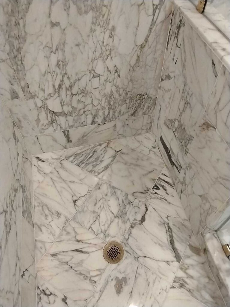 Marble shower stall with drain, Rose Restoration project