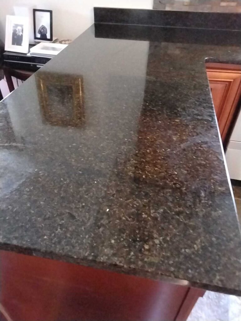 Granite countertop with dark speckles, Rose Restoration project