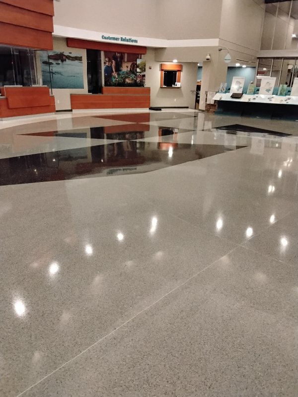 Polished stone floor with reflections, Rose Restoration project