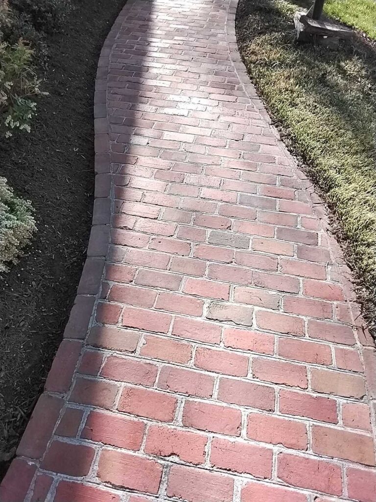 After: the same brick walkway in Oakton, VA after Rose Restoration's work
