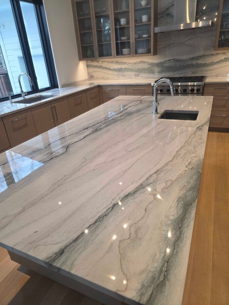 Polished stone countertop with undermount sink, Rose Restoration project