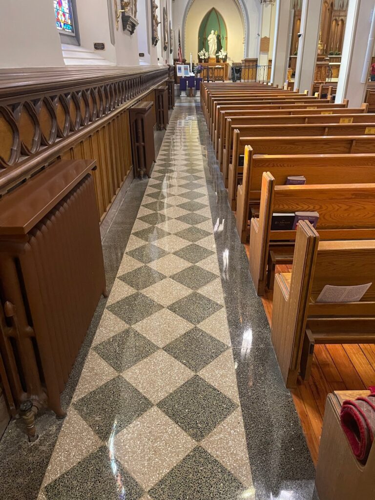 Checkered stone aisle floor in a church, Rose Restoration project