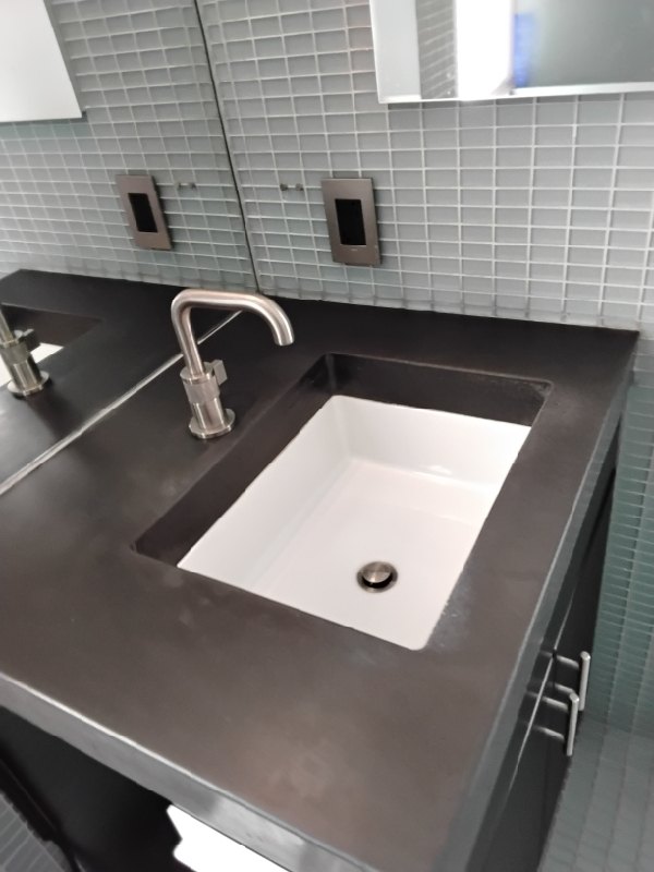 After: the same concrete vanity top in Washington, DC after Rose Restoration's work