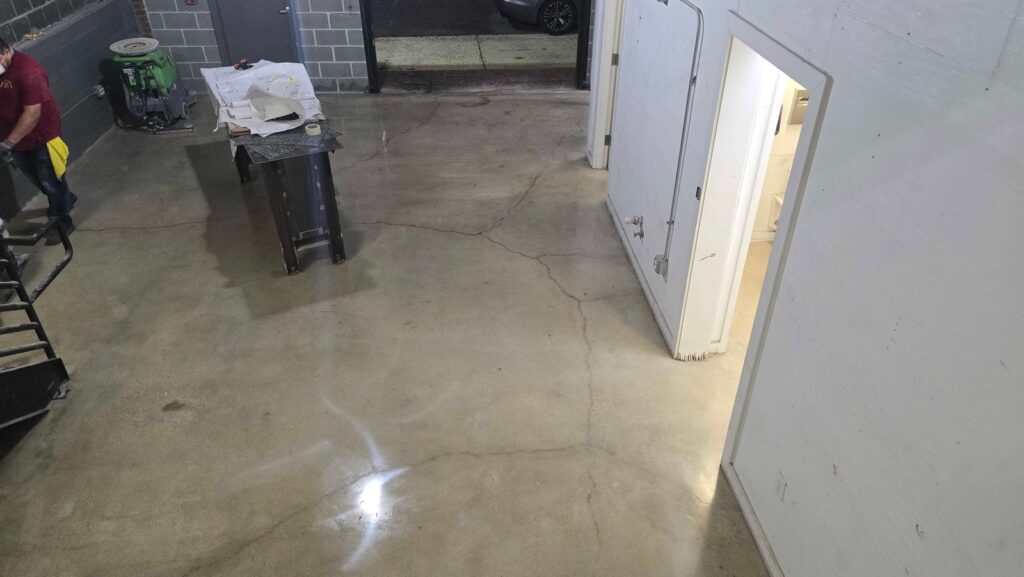 After: the same cracked concrete floor, polished in Washington, DC after Rose Restoration's work