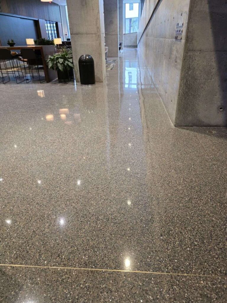 Polished stone floor with speckles, Rose Restoration project